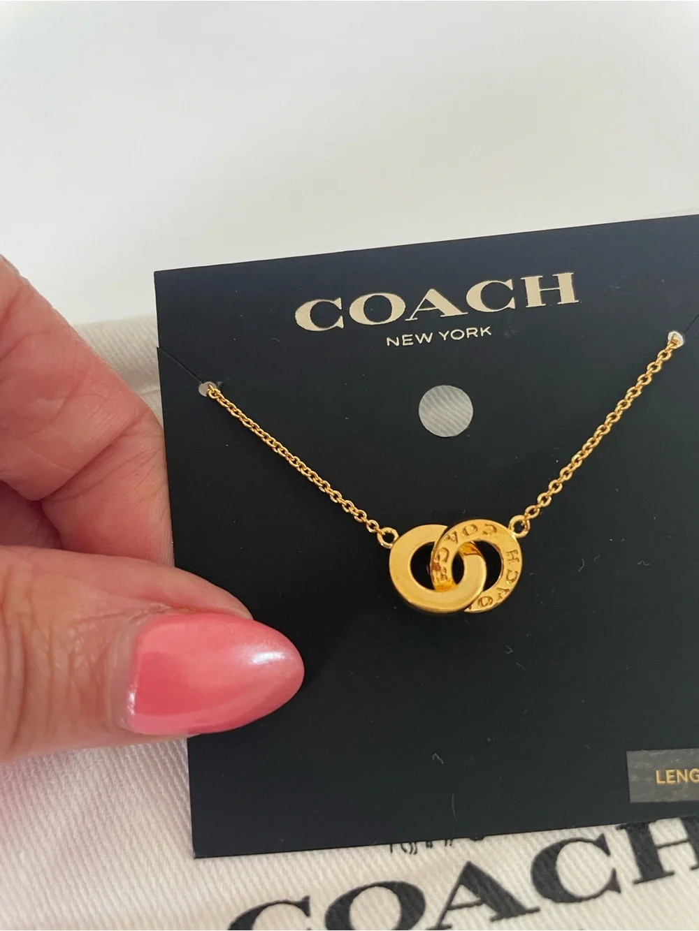 COACH Gold Interlocking Ring Pendant Necklace